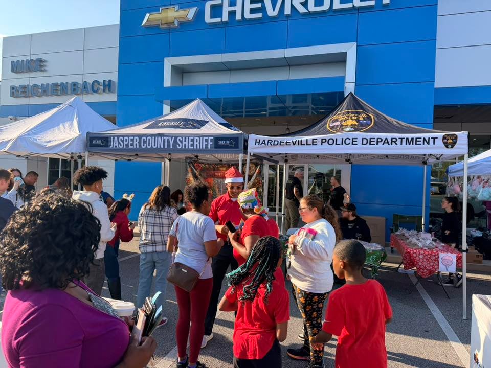Feeding the Community Carnival Holiday Giveback booths